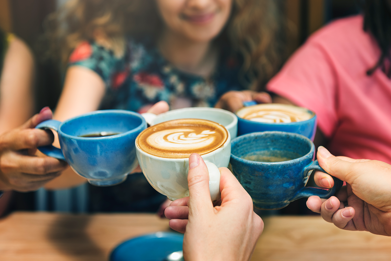 Young Women Drinking Coffee
